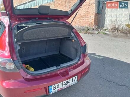 Красный Мазда 3, объемом двигателя 1.35 л и пробегом 173 тыс. км за 6200 $, фото 1 на Automoto.ua