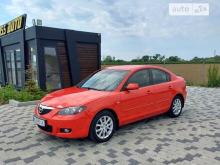 Красный Мазда 3, объемом двигателя 2 л и пробегом 163 тыс. км за 6700 $, фото 1 на Automoto.ua