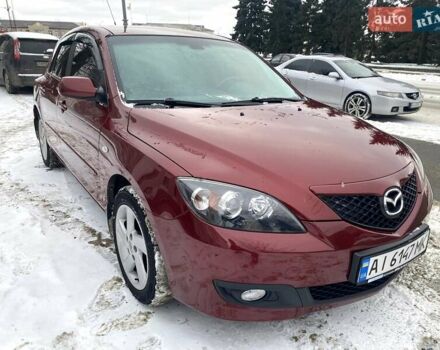 Червоний Мазда 3, об'ємом двигуна 1.6 л та пробігом 167 тис. км за 6000 $, фото 1 на Automoto.ua