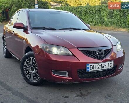 Красный Мазда 3, объемом двигателя 1.6 л и пробегом 228 тыс. км за 5850 $, фото 1 на Automoto.ua
