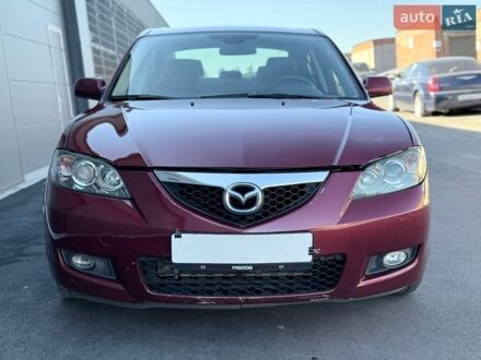 Красный Мазда 3, объемом двигателя 2 л и пробегом 247 тыс. км за 3900 $, фото 1 на Automoto.ua