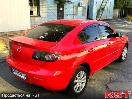 Красный Мазда 3, объемом двигателя 2 л и пробегом 200 тыс. км за 5400 $, фото 1 на Automoto.ua