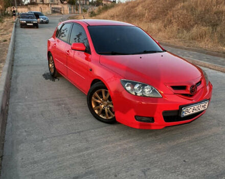 Красный Мазда 3, объемом двигателя 2 л и пробегом 232 тыс. км за 6499 $, фото 1 на Automoto.ua