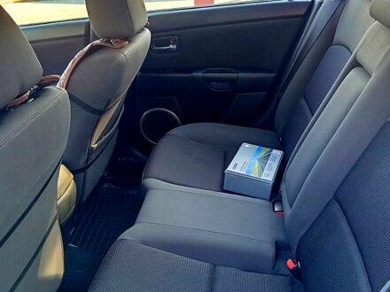 Червоний Мазда 3, об'ємом двигуна 1.6 л та пробігом 185 тис. км за 6250 $, фото 1 на Automoto.ua