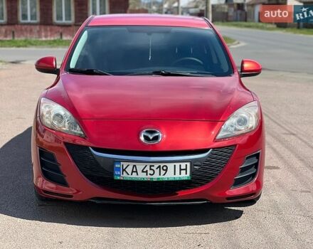 Красный Мазда 3, объемом двигателя 2 л и пробегом 200 тыс. км за 6500 $, фото 1 на Automoto.ua