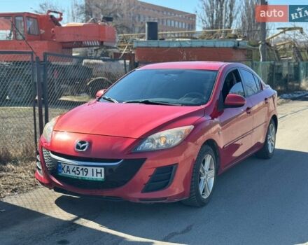 Красный Мазда 3, объемом двигателя 2 л и пробегом 200 тыс. км за 5700 $, фото 1 на Automoto.ua