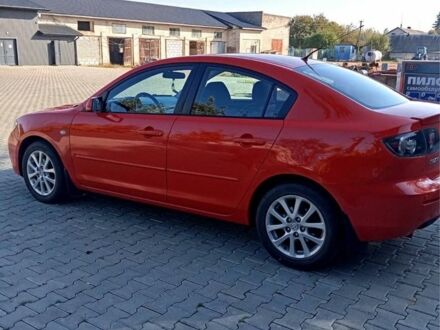 Красный Мазда 3, объемом двигателя 1.6 л и пробегом 185 тыс. км за 5199 $, фото 1 на Automoto.ua