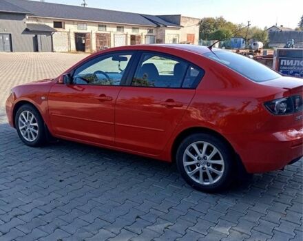 Красный Мазда 3, объемом двигателя 1.6 л и пробегом 185 тыс. км за 5199 $, фото 1 на Automoto.ua