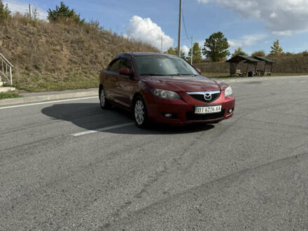 Красный Мазда 3, объемом двигателя 1.6 л и пробегом 380 тыс. км за 6000 $, фото 1 на Automoto.ua