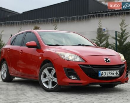 Красный Мазда 3, объемом двигателя 2.2 л и пробегом 226 тыс. км за 6499 $, фото 1 на Automoto.ua