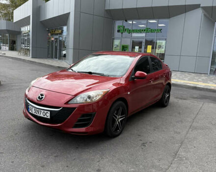 Красный Мазда 3, объемом двигателя 2 л и пробегом 217 тыс. км за 6699 $, фото 1 на Automoto.ua