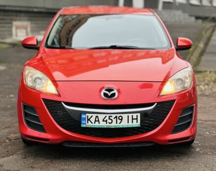 Красный Мазда 3, объемом двигателя 2 л и пробегом 199 тыс. км за 6800 $, фото 1 на Automoto.ua