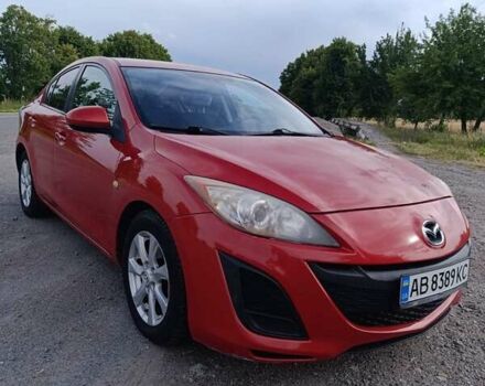 Красный Мазда 3, объемом двигателя 2 л и пробегом 161 тыс. км за 6600 $, фото 1 на Automoto.ua