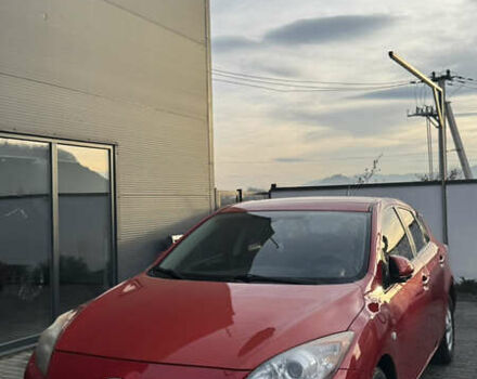 Красный Мазда 3, объемом двигателя 1.56 л и пробегом 275 тыс. км за 7000 $, фото 1 на Automoto.ua