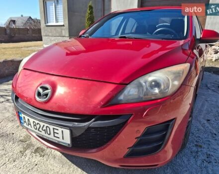 Красный Мазда 3, объемом двигателя 1.6 л и пробегом 317 тыс. км за 5000 $, фото 1 на Automoto.ua
