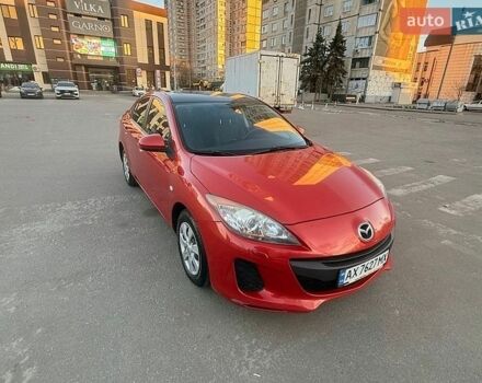 Красный Мазда 3, объемом двигателя 1.6 л и пробегом 120 тыс. км за 10500 $, фото 1 на Automoto.ua