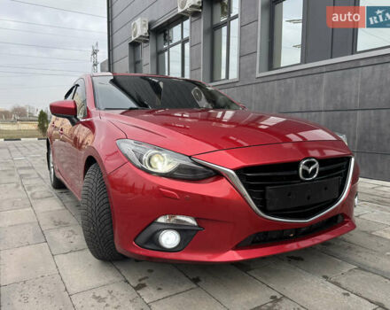 Красный Мазда 3, объемом двигателя 1.5 л и пробегом 140 тыс. км за 13950 $, фото 1 на Automoto.ua