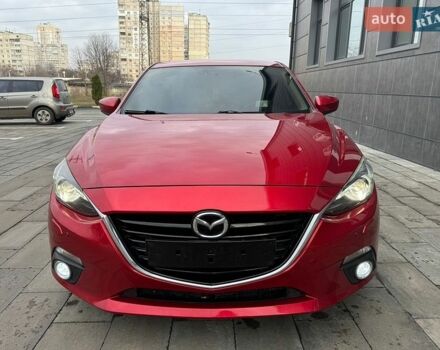 Красный Мазда 3, объемом двигателя 1.5 л и пробегом 145 тыс. км за 13999 $, фото 1 на Automoto.ua