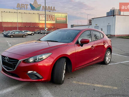 Красный Мазда 3, объемом двигателя 2 л и пробегом 130 тыс. км за 12000 $, фото 1 на Automoto.ua