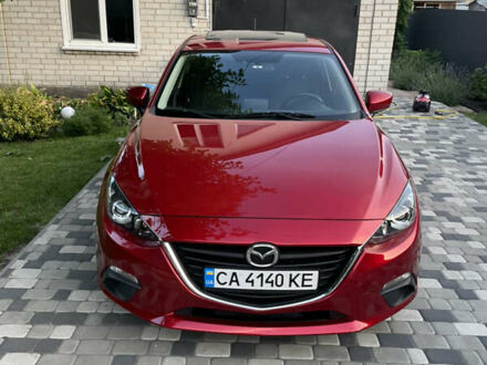 Красный Мазда 3, объемом двигателя 2 л и пробегом 122 тыс. км за 11700 $, фото 1 на Automoto.ua
