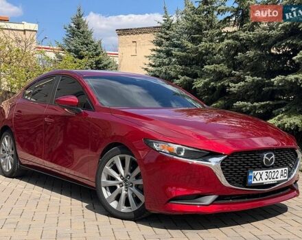 Красный Мазда 3, объемом двигателя 2.49 л и пробегом 113 тыс. км за 15300 $, фото 1 на Automoto.ua