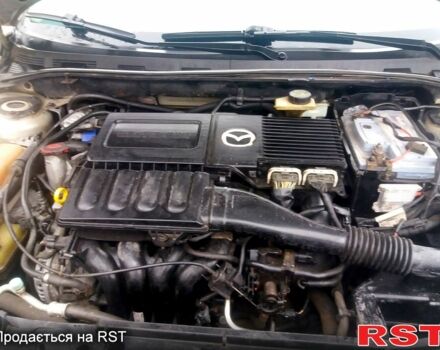Мазда 3, объемом двигателя 1.6 л и пробегом 245 тыс. км за 3150 $, фото 5 на Automoto.ua