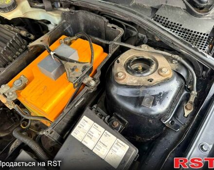 Мазда 3, объемом двигателя 1.6 л и пробегом 215 тыс. км за 5850 $, фото 11 на Automoto.ua