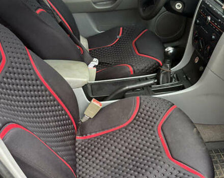 Мазда 3, объемом двигателя 1.3 л и пробегом 321 тыс. км за 2550 $, фото 4 на Automoto.ua