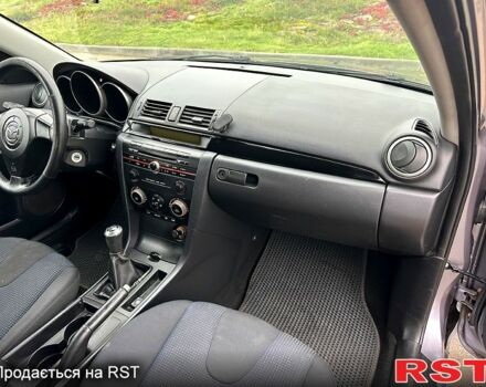 Мазда 3, объемом двигателя 2 л и пробегом 250 тыс. км за 2999 $, фото 11 на Automoto.ua