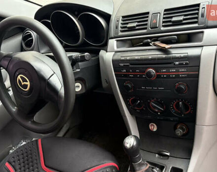 Мазда 3, объемом двигателя 1.3 л и пробегом 321 тыс. км за 2550 $, фото 6 на Automoto.ua