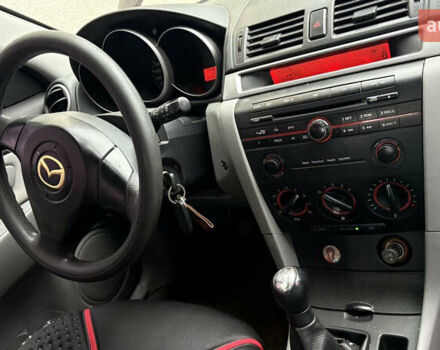 Мазда 3, объемом двигателя 1.3 л и пробегом 321 тыс. км за 2550 $, фото 3 на Automoto.ua