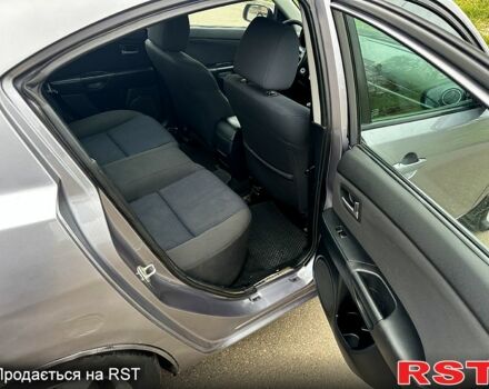 Мазда 3, объемом двигателя 2 л и пробегом 250 тыс. км за 2999 $, фото 10 на Automoto.ua
