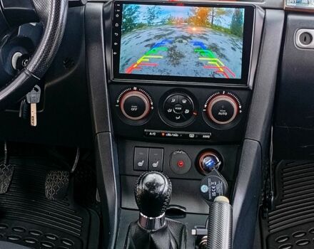Мазда 3, объемом двигателя 2 л и пробегом 242 тыс. км за 5000 $, фото 8 на Automoto.ua