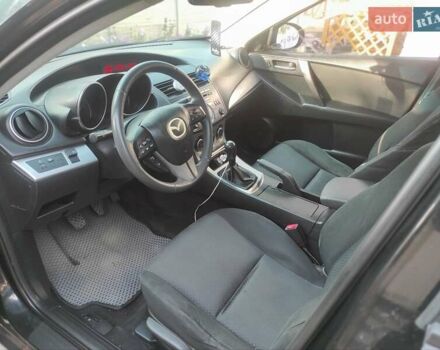 Мазда 3, объемом двигателя 2 л и пробегом 275 тыс. км за 6400 $, фото 9 на Automoto.ua