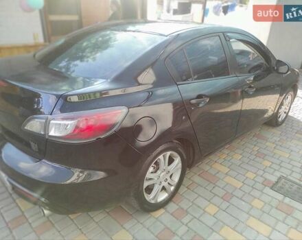 Мазда 3, объемом двигателя 2 л и пробегом 275 тыс. км за 6400 $, фото 7 на Automoto.ua