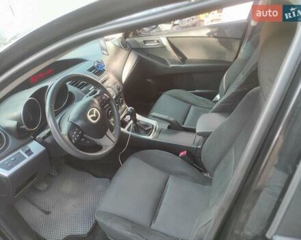 Мазда 3, объемом двигателя 2 л и пробегом 275 тыс. км за 6400 $, фото 10 на Automoto.ua