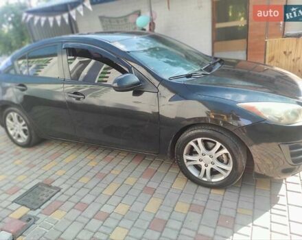 Мазда 3, объемом двигателя 2 л и пробегом 275 тыс. км за 6400 $, фото 6 на Automoto.ua