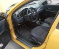 Желтый Мазда 3, объемом двигателя 2 л и пробегом 330 тыс. км за 2800 $, фото 11 на Automoto.ua