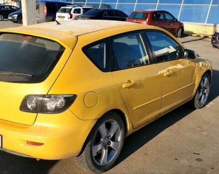 Желтый Мазда 3, объемом двигателя 2 л и пробегом 270 тыс. км за 4000 $, фото 1 на Automoto.ua