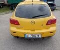 Желтый Мазда 3, объемом двигателя 2 л и пробегом 330 тыс. км за 2800 $, фото 3 на Automoto.ua