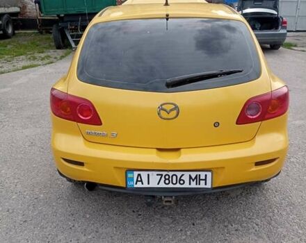 Желтый Мазда 3, объемом двигателя 2 л и пробегом 330 тыс. км за 2800 $, фото 4 на Automoto.ua