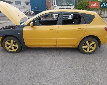 Желтый Мазда 3, объемом двигателя 2 л и пробегом 330 тыс. км за 2800 $, фото 3 на Automoto.ua