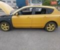 Желтый Мазда 3, объемом двигателя 2 л и пробегом 330 тыс. км за 2800 $, фото 3 на Automoto.ua