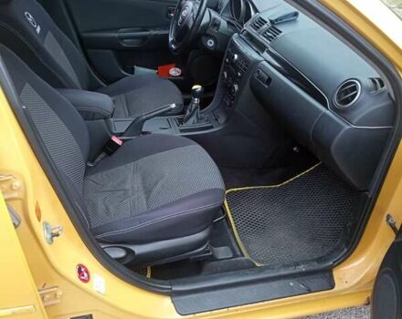 Желтый Мазда 3, объемом двигателя 2 л и пробегом 330 тыс. км за 2800 $, фото 7 на Automoto.ua