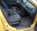 Желтый Мазда 3, объемом двигателя 2 л и пробегом 330 тыс. км за 2800 $, фото 7 на Automoto.ua