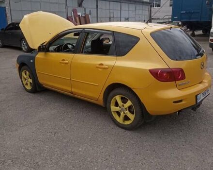 Желтый Мазда 3, объемом двигателя 2 л и пробегом 330 тыс. км за 2800 $, фото 2 на Automoto.ua