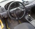 Желтый Мазда 3, объемом двигателя 2 л и пробегом 330 тыс. км за 2800 $, фото 12 на Automoto.ua