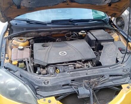 Желтый Мазда 3, объемом двигателя 2 л и пробегом 330 тыс. км за 2800 $, фото 1 на Automoto.ua