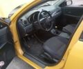 Желтый Мазда 3, объемом двигателя 2 л и пробегом 330 тыс. км за 2800 $, фото 10 на Automoto.ua
