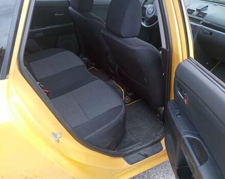 Желтый Мазда 3, объемом двигателя 2 л и пробегом 330 тыс. км за 2800 $, фото 8 на Automoto.ua